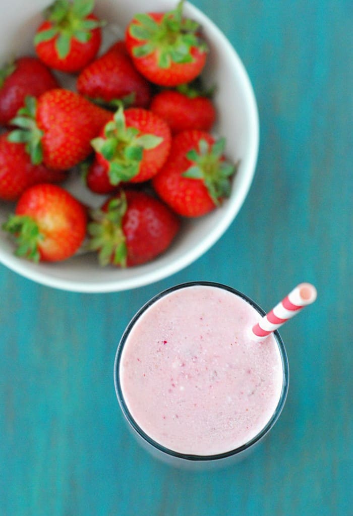 Strawberry Cheesecake Smoothie - Great as a filling breakfast or post-workout recovery drink. This low carb smoothie is packed with protein and gives your favorite strawberry cheesecake a run for your money.