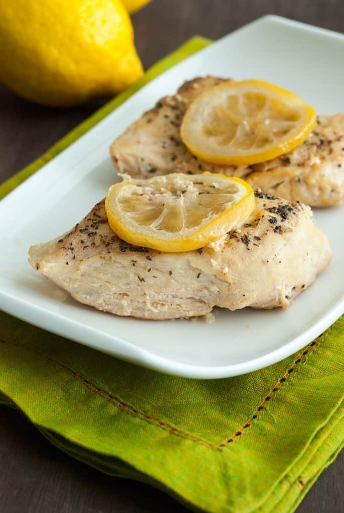 Slow Cooker Lemon Garlic Chicken - This dish is bright, flavorful, and healthy, too! (Low Carb and Gluten-Free)