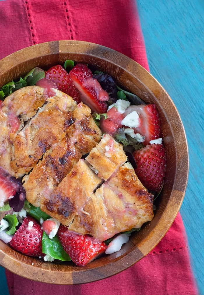 Strawberry Chicken Salad - If you take a look around your favorite produce department or farmer's market, you may notice that it's the height of strawberry season, making it a perfect time to use those bright, sweet berries in as many recipes as possible. This grilled chicken salad recipe pairs tender chicken with beautiful berries to give you a delicious, nutritious entree.