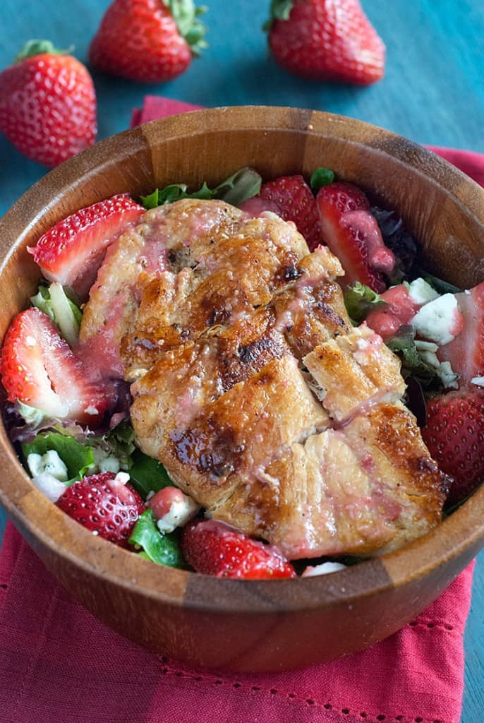 Strawberry Chicken Salad - If you take a look around your favorite produce department or farmer's market, you may notice that it's the height of strawberry season, making it a perfect time to use those bright, sweet berries in as many recipes as possible. This grilled chicken salad recipe pairs tender chicken with beautiful berries to give you a delicious, nutritious entree.
